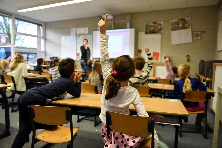 Students collaborating in a bright classroom